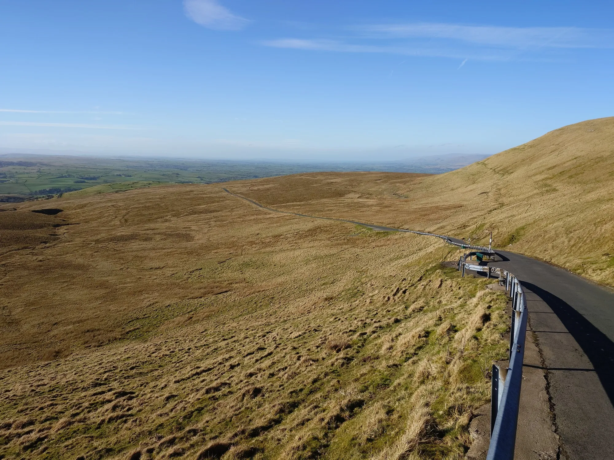Open moorland with the path running away to the horizon
